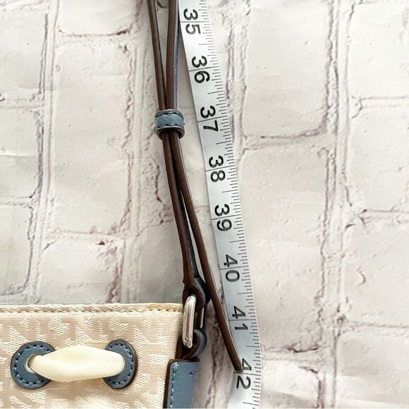 DKNY Ivory Cream and Blue Trims Lace Bow Front Bucket Style Crossbody Purse Bag - Picture 10 of 14